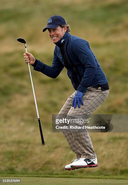 Actor Greg Kinnear reacts after playing a shot on the 17th hole during the third round of The Alfred Dunhill Links Championship at The Old Course on...