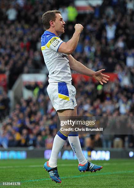 Richard Myler of Warrington Wolves celebrates scoring the opening try during the Stobart Super League Grand Final between Warrington Wolves and Leeds...