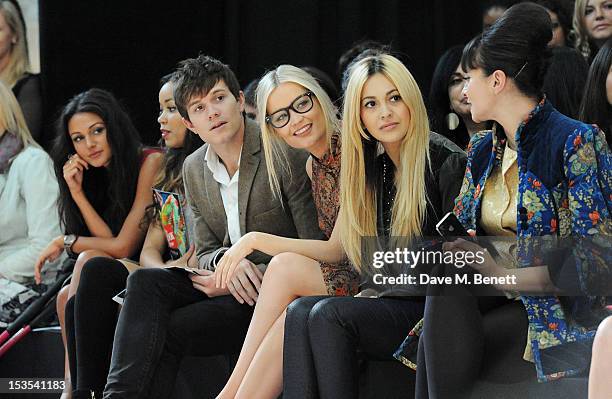 Michelle Keegan, Dionne Bromfield, Will Best, Laura Whitmore, Zara Martin and Gizzi Erskine sit in the front row at The LOOK Show in association with...