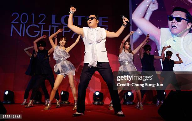 Singer Psy performs onstage at a Lotte Entertainment Night during the 17th Busan International Film Festival at the Lotte Hotel on October 6, 2012 in...