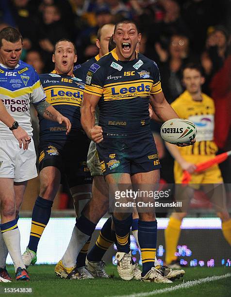Ryan Hall of Leeds Rhinos celebrates scoring his team's fourth try during the Stobart Super League Grand Final between Warrington Wolves and Leeds...