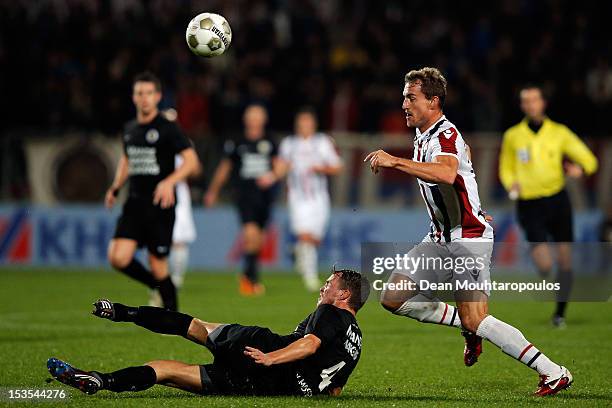 Aurelien Joachim of Willem II and Frank Van Mosselveld of RKC battle for the ball during the Eredivisie match between Willem II Tilburg and RKC...