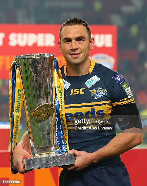 Kevin Sinfield of Leeds Rhinos poses with the trophy following his team's victory at the end of the Stobart Super League Grand Final between...