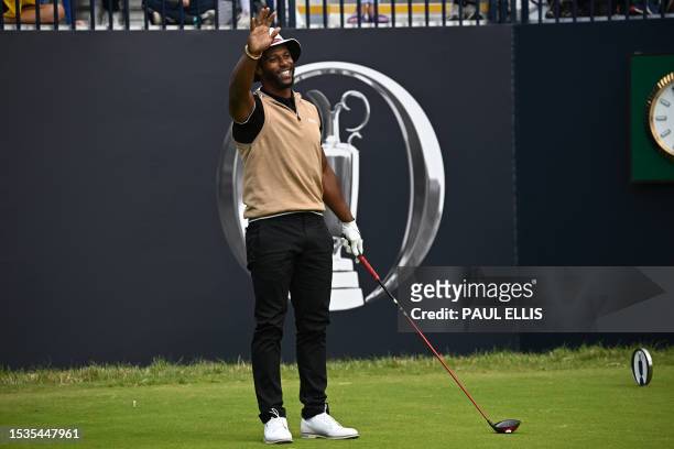 Former NFL player Victor Cruz takes part in the Open Invitational celebrity competition, ahead of the 151st British Open Golf Championship at Royal...