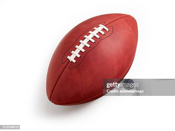 football on white - american football ball stock pictures, royalty-free photos & images