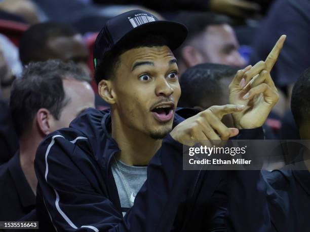 Victor Wembanyama of the San Antonio Spurs reacts on the bench in the first half of a 2023 NBA Summer League game against the Washington Wizards at...