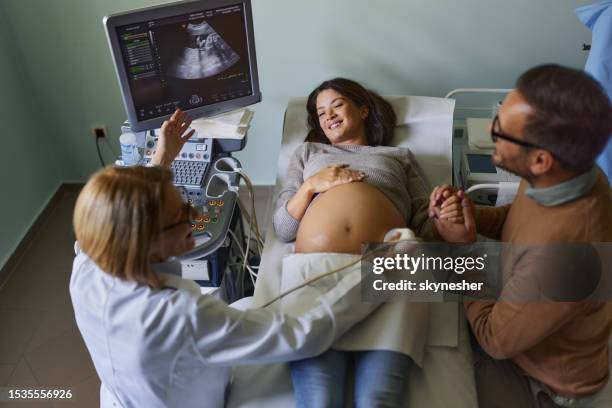 ultrasound exam at gynecologists'! - prenatal care stockfoto's en -beelden