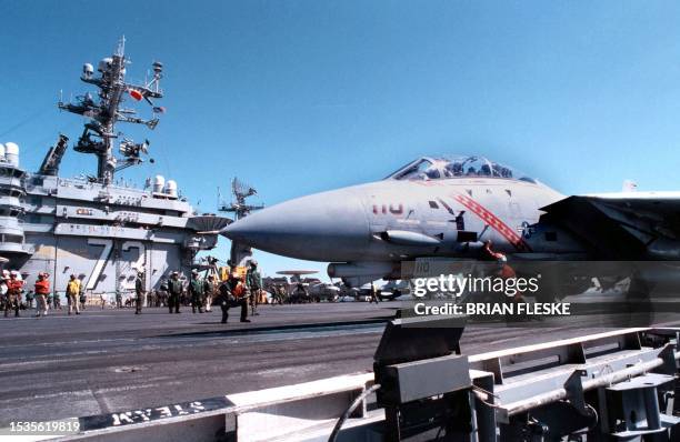 An F-14B "Tomcat" attached to Fighter Squadron 102 prepares to launch from the aircraft carrier USS George Washington 17 February. VF-102 and George...