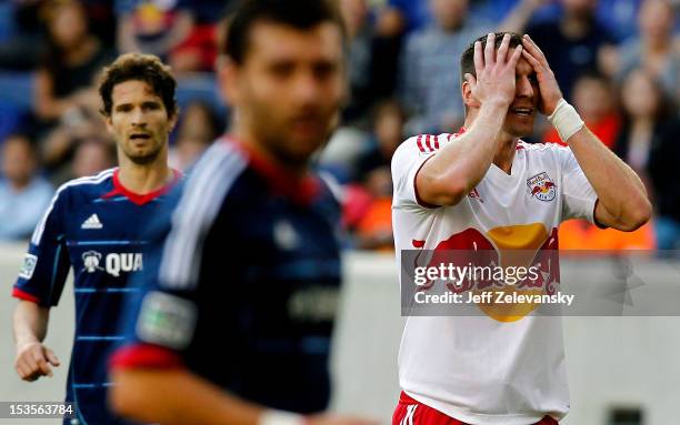 Kenny Cooper of New York Red Bulls reacts after missing a shot against the Chicago Fire during their match at Red Bull Arena on October 6, 2012 in...