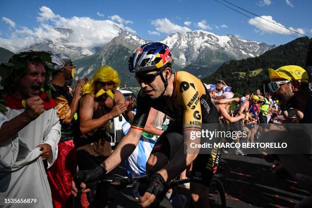 Jumbo-Visma's Belgian rider Wout Van Aert cycles in the final ascent of Saint-Gervais-les-Bains in the last kilometers of the 15th stage of the 110th...