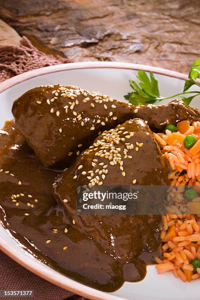 mole poblano - savoury sauce stock pictures, royalty-free photos & images