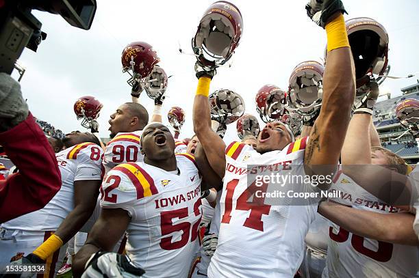 Jared Brackens of the Iowa State Cyclones celebrates with teammates after defeating the TCU Horned Frogs during the Big 12 Conference game on October...