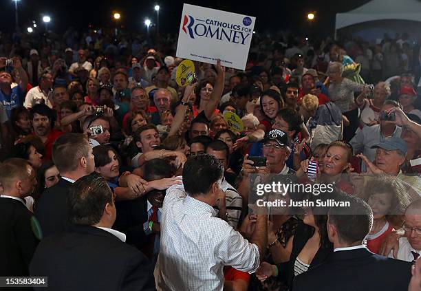 Republican presidential candidate, former Massachusetts Gov. Mitt Romney greets supporters during a campaign rally on October 6, 2012 in Apopka,...