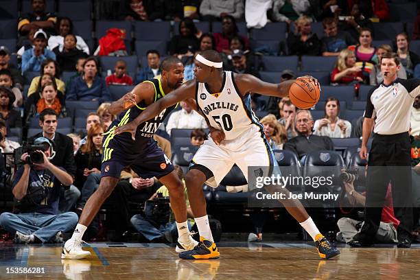 Zach Randolph of the Memphis Grizzlies drives against Marcus Slaughter of Real Madrid on October 6, 2012 at FedExForum in Memphis, Tennessee. NOTE TO...