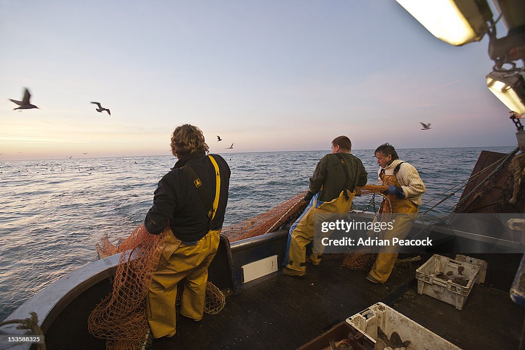 Trawler fishing at night