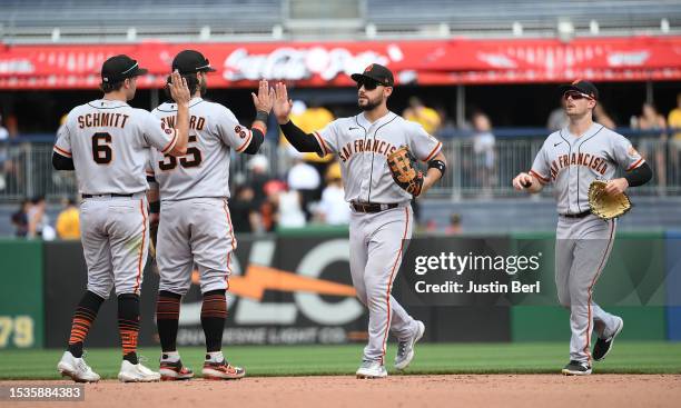 The San Francisco Giants celebrate following a 8-4 win over the Pittsburgh Pirates during the game at PNC Park on July 16, 2023 in Pittsburgh,...