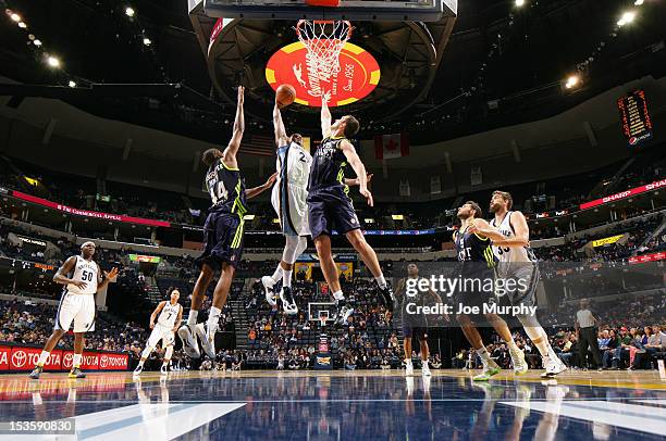 Rudy Gay of the Memphis Grizzlies goes to the basket against against Marcus Slaughter and Mirza Begic of Real Madrid on October 6, 2012 at FedExForum...