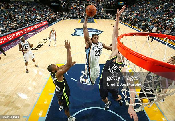 Rudy Gay of the Memphis Grizzlies goes to the basket against against Marcus Slaughter and Mirza Begic Real Madrid on October 6, 2012 at FedExForum in...