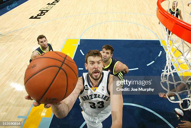 Marc Gasol of the Memphis Grizzlies goes to the basket against Real Madrid on October 6, 2012 at FedExForum in Memphis, Tennessee. NOTE TO USER: User...