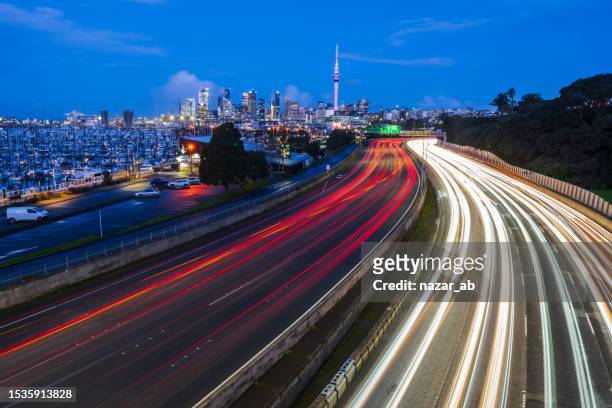 auckland city traffic. - auckland tower stock pictures, royalty-free photos & images