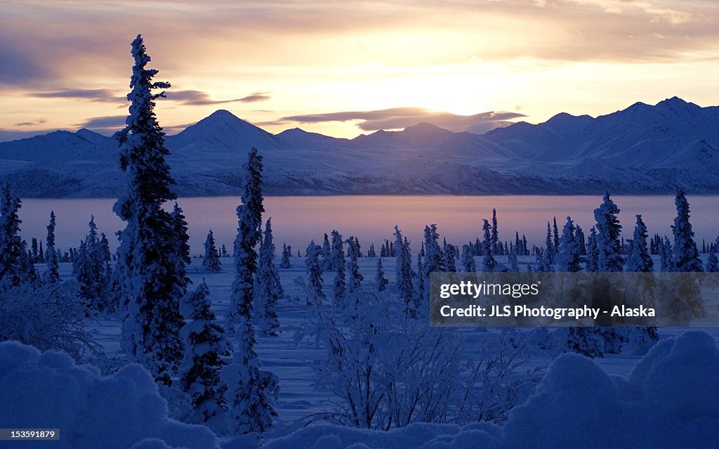 Sunrise on ice fog