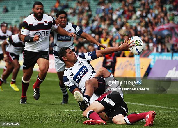 Charles Piutau of Auckland offloads the ball during the round 13 ITM Cup match between North Harbour and Auckland at North Harbour Stadium on October...