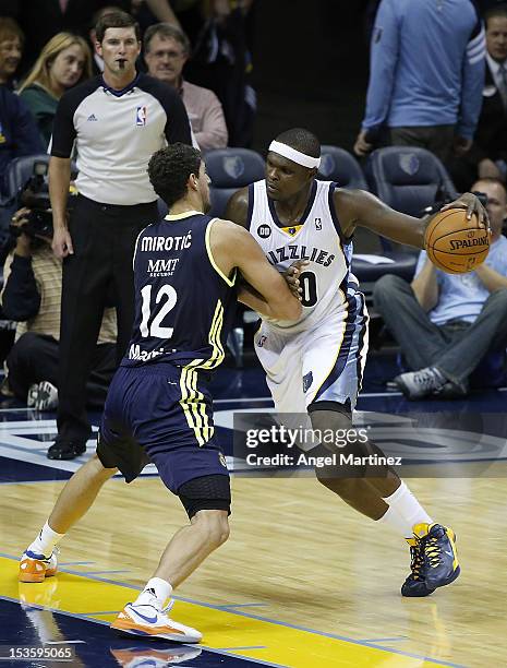 Zach Randolph of the Memphis Grizzlies drives against Nikola Mirotic of Real Madrid during the Euroleague American Tour 12 game at FedExForum on...