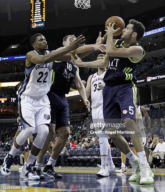 Rudy Fernandez of Real Madrid competes for the ball with Rudy Gay of the Memphis Grizzlies during the Euroleague American Tour 12 game at FedExForum...