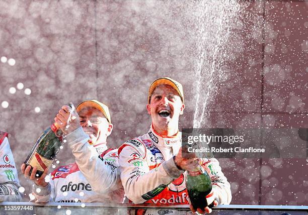 Jamie Whincup driver of the Team Vodafone Holden celebrates after he and Paul Dumbrell won the Bathurst 1000, which is round 11 of the V8 Supercars...