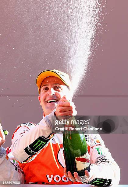 Jamie Whincup driver of the Team Vodafone Holden celebrates after he and Paul Dumbrell won the Bathurst 1000, which is round 11 of the V8 Supercars...