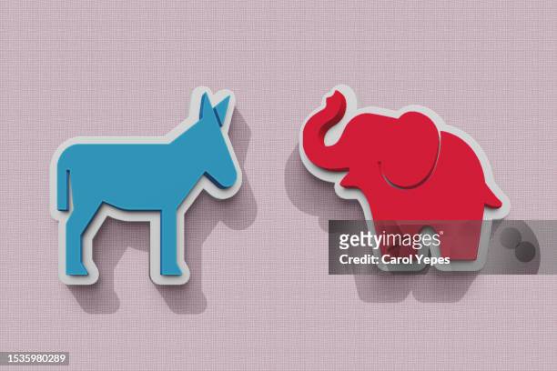 democratic blue donkey and republican red elephant - spanish congress stock pictures, royalty-free photos & images