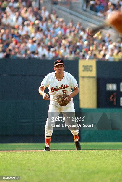 Brooks Robinson of the Baltimore Orioles is down and ready to make a play on the ball during an Major League Baseball game circa 1966 at Memorial...