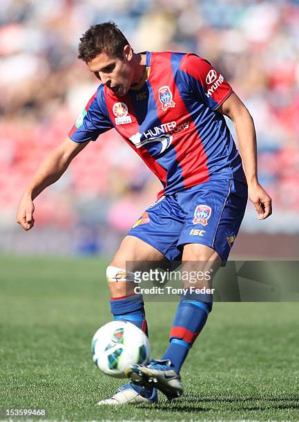 Josh Mitchell of the Jets in action during the round one A-League match between the Newcastle Jets and Adelaide United at Hunter Stadium on October...