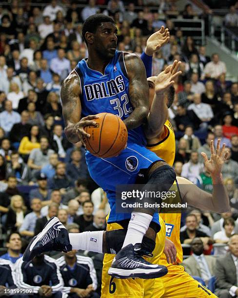 Mayo of Dallas is challenged by Sven Schultze of Berlin during the NBA Europe Live 2012 Tour match between Alba Berlin and Dallas Mavericks at O2...