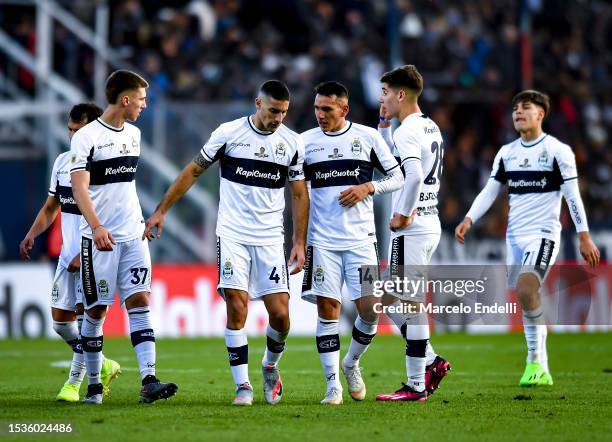 Players of Gimnasia y Esgrima La Plata leave the field after first half during a match between Gimnasia y Esgrima La Plata and Boca Juniors as part...