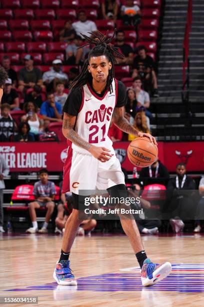Emoni Bates of the Cleveland Cavaliers dribbles the ball during the game against the Brooklyn Nets during the 2023 NBA Las Vegas Summer League...
