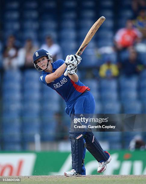 England captain Charlotte Edwards hits out for six runs during the ICC Women's World Twenty20 2012 Final between Australia and England at R....