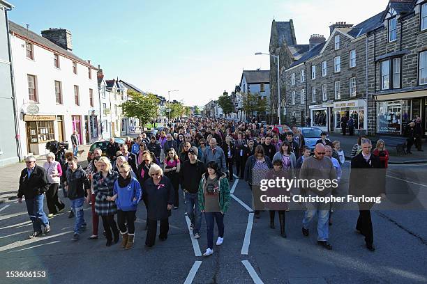 Members of the community of Machynlleth walk together to St Peter's Church for a service with prayers for missing five-year-old April Jones on...