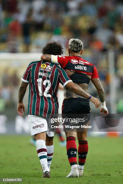 Marcelo of Fluminense hugs with Gabriel Barbosa of Flamengo during a match between Fluminense and Flamengo as part of Brasileirao 2023 at Maracana...