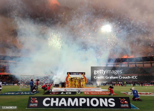 Captain Jodie Fields of Australia leads celebrations after defeating England during the ICC Women's World Twenty20 2012 Final between England and...