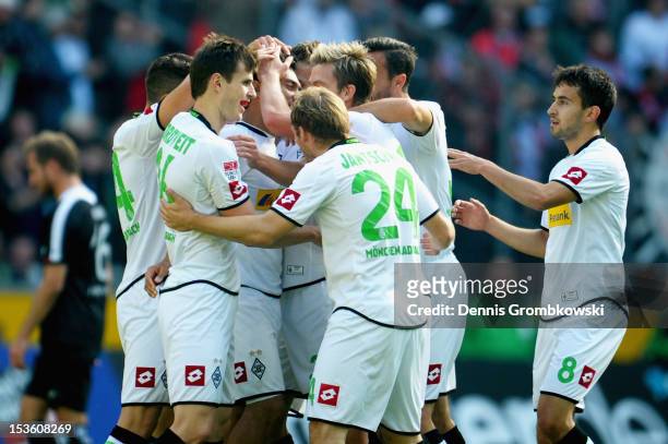 Juan Arango of Moenchengladbach celebrates with teammates after scoring his team's first goal during the Bundesliga match between VfL Borussia...