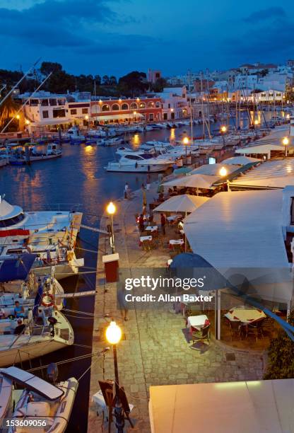 restaurants alongside harbourside - ciutadella stock pictures, royalty-free photos & images