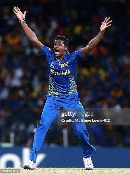 Ajantha Mendis of Sri Lanka celebratesbowling Dwayne Bravo of the West Indies for LBW during the ICC World Twenty20 2012 Final between Sri Lanka and...