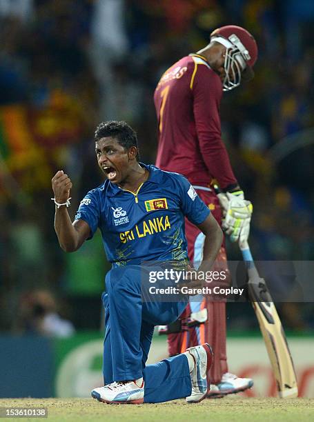 Ajantha Mendis of Sri Lanka celebrates dismissing Andre Russell of the West Indies during the ICC World Twenty20 2012 Final between Sri Lanka and the...