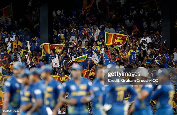 Sri Lanka fans cheer during the ICC World Twenty20 2012 Final between Sri Lanka and West Indies at R. Premadasa Stadium on October 7, 2012 in...