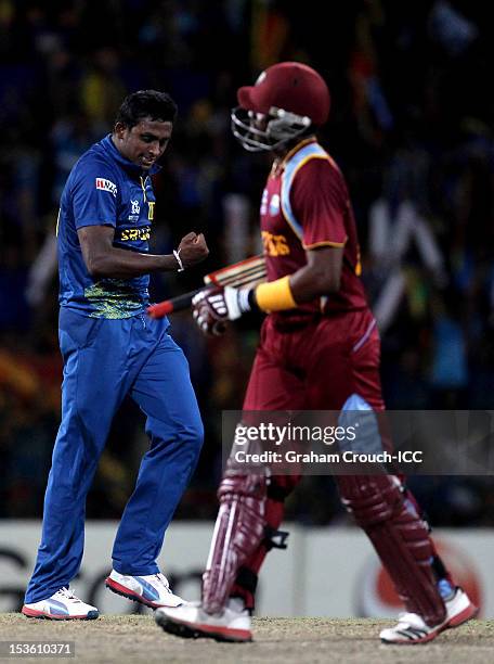 Ajantha Mendis of Sri Lanka celebrates after trapping Dwayne Bravo of West Indies LBW during the ICC World Twenty20 2012 Final between Sri Lanka and...