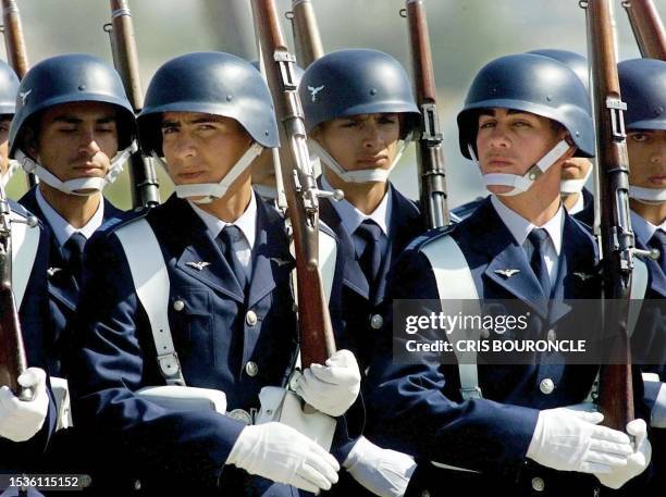 Members of the Chilean armed forces march during a military parade 21 March 2000 in Santiago. Miembros de la Fuerza Aerea chilena , marchan en...