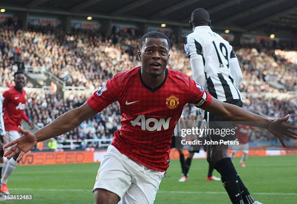 Patrice Evra of Manchester United celebrates scoring their first goal during the Barclays Premier League match between Newcastle United and...