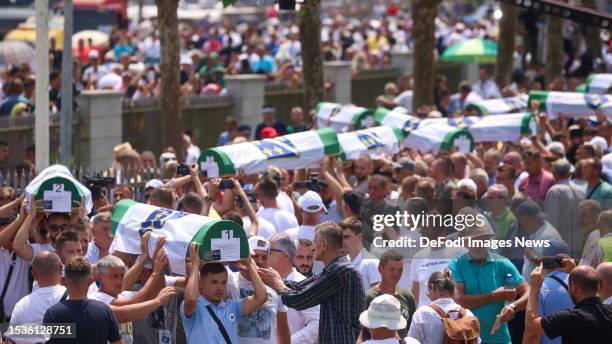 Coffins of 30 more victims of the Srebrenica massacre, Europes only acknowledged genocide since World War II, buried at SrebrenicaPotocari Memorial...