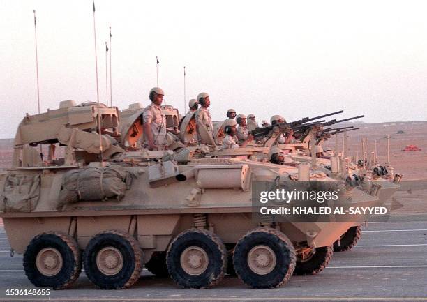 Saudi army armoured vehicles parade during the 100th anniversary of al-Saud dynasty's celebration ceremony in Riyadh 26 January. In 1902 Abdel Aziz...